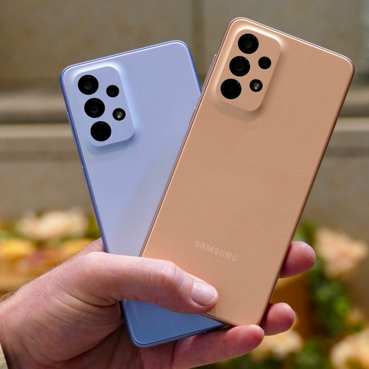 Samsung Galaxy A53 5G and Galaxy A33 5G blue and peach colors.