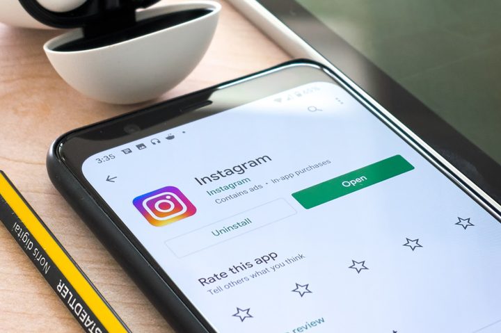 Instagram app on the Google Play Store on an Android smartphone.