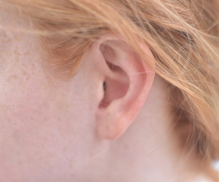 The Eargo hearing aid isn't visible when worn.