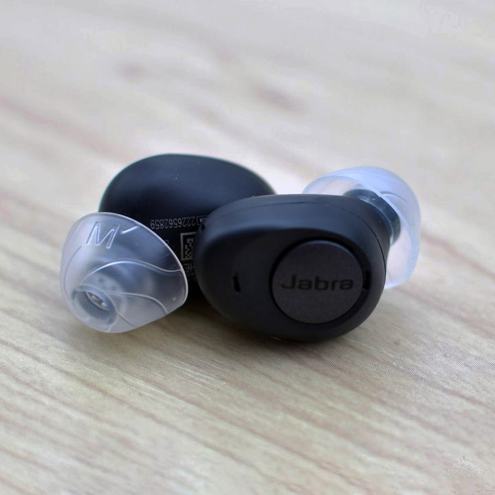 The Jabra Enhance Plus earbuds snap together magnetically.