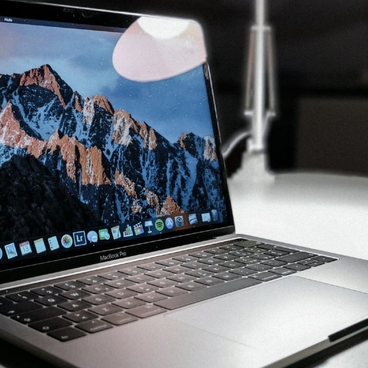 A MacBook Pro set on a table.