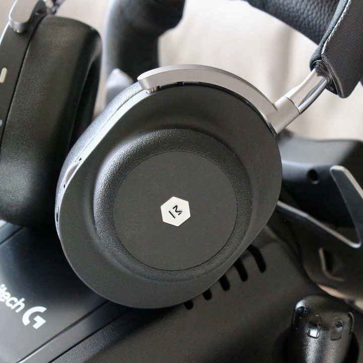 Master & Dynamic MG20 headphone cup and logo.