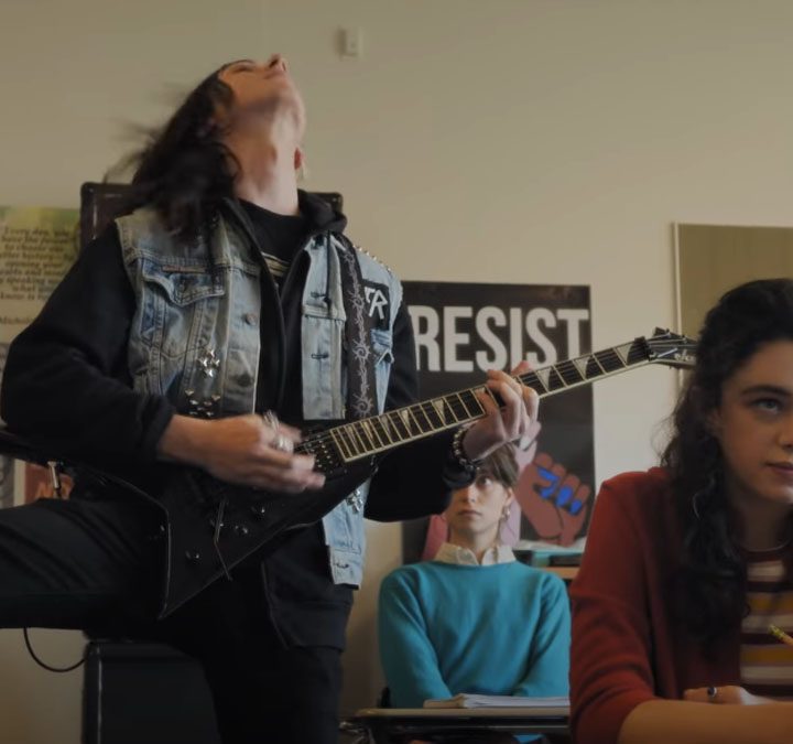 Adrian Greensmith and Isis Hainsworth in Metal Lords.