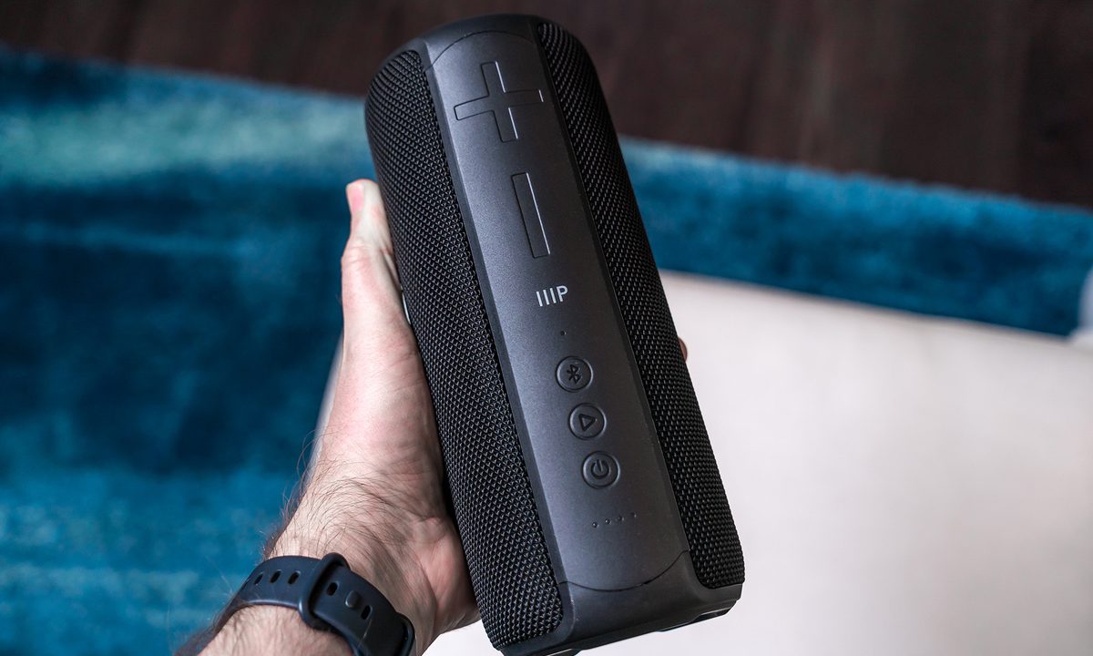 Monoprice Harmony Capsule 200 held in hand to show relative size.