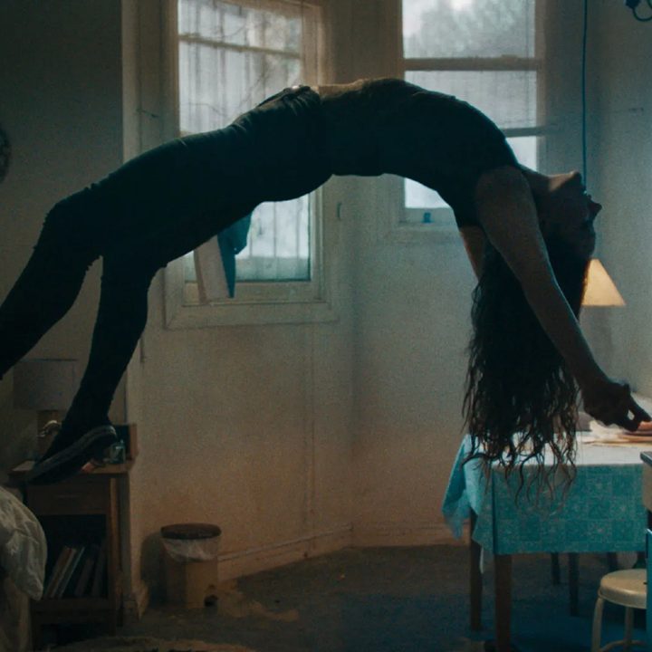 Morfydd Clark levitates in Saint Maud.