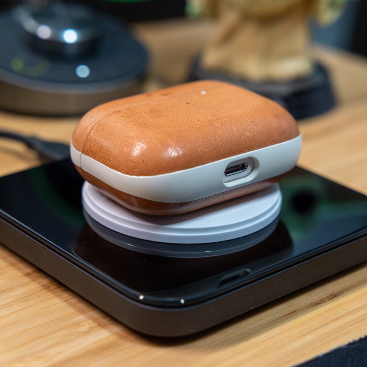 AirPods on Nomad Base One charger.