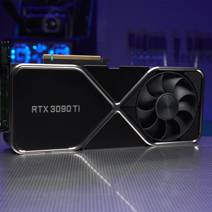 A Nvidia RTX 3090 Ti sits on a silver table.