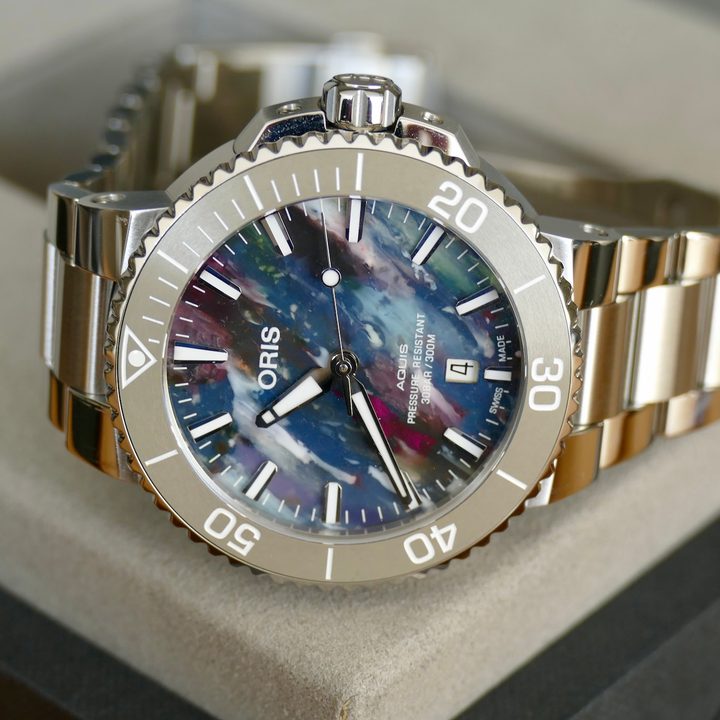 The bezel of the Oris Aquis Date Upcycle watch.