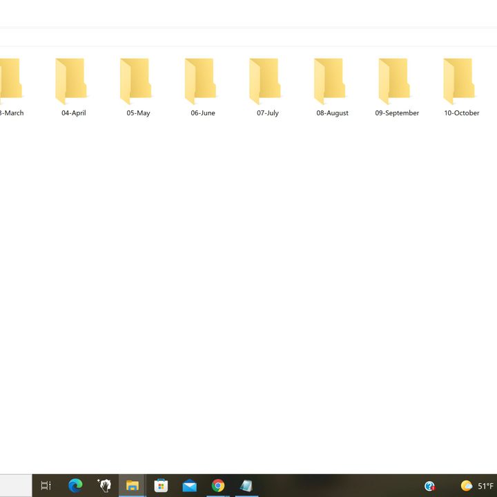 Folders labeled with months of the year.