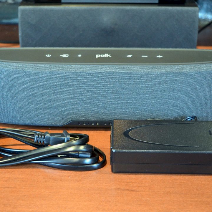 The Polk MagniFi Mini AX soundbar seen with external power supply and AC cord.