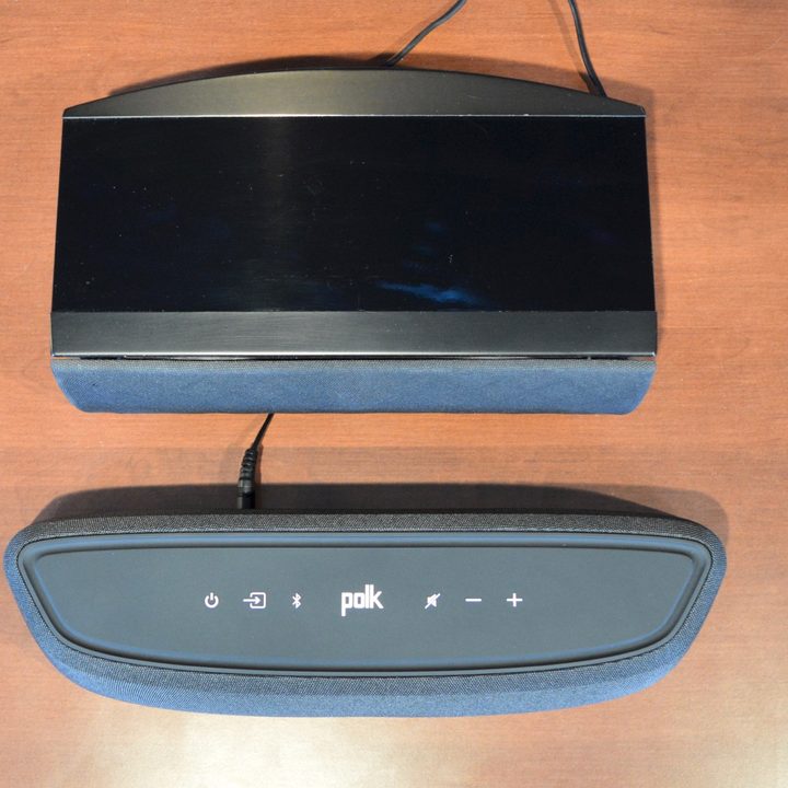 Top view of the Polk MagniFi Mini AX soundbar seen next to an Energy center channel wired speaker.