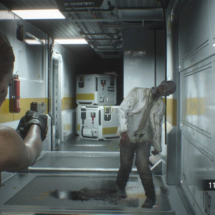 Jill Valentine shoots a zombie in the next-gen version of Resident Evil 3.