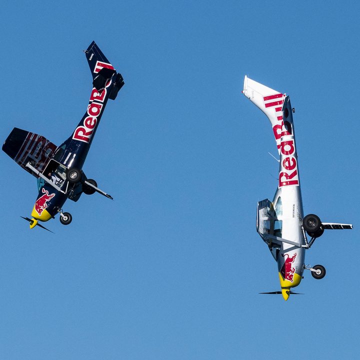 Red Bull Plane Swap Cesna aircraft in flight.
