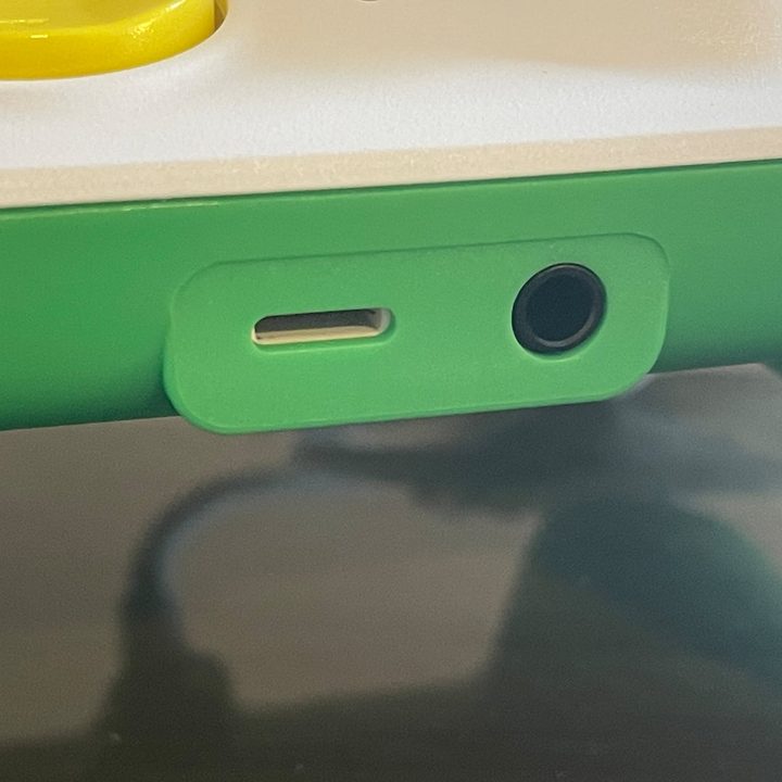 A close-up of the ports on front of The RiotPWR ESL game controller.