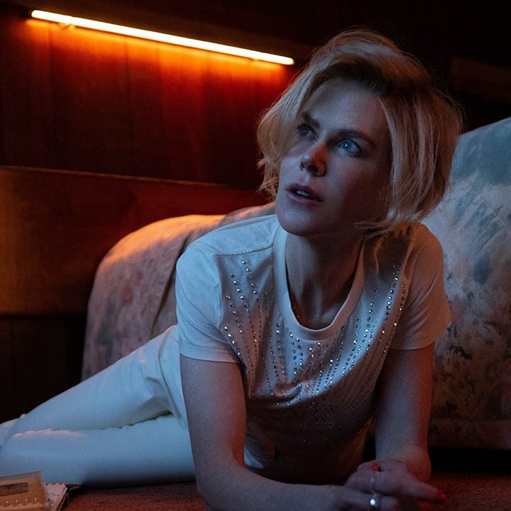 Nicole Kidman on the floor looking up in a scene from Apple TV+'s Roar.