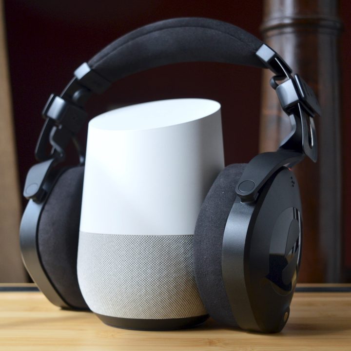 The Rode NTH-100 headphones encircle a smart speaker.