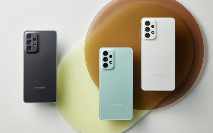 Samsung Galaxy A73 in three colors.
