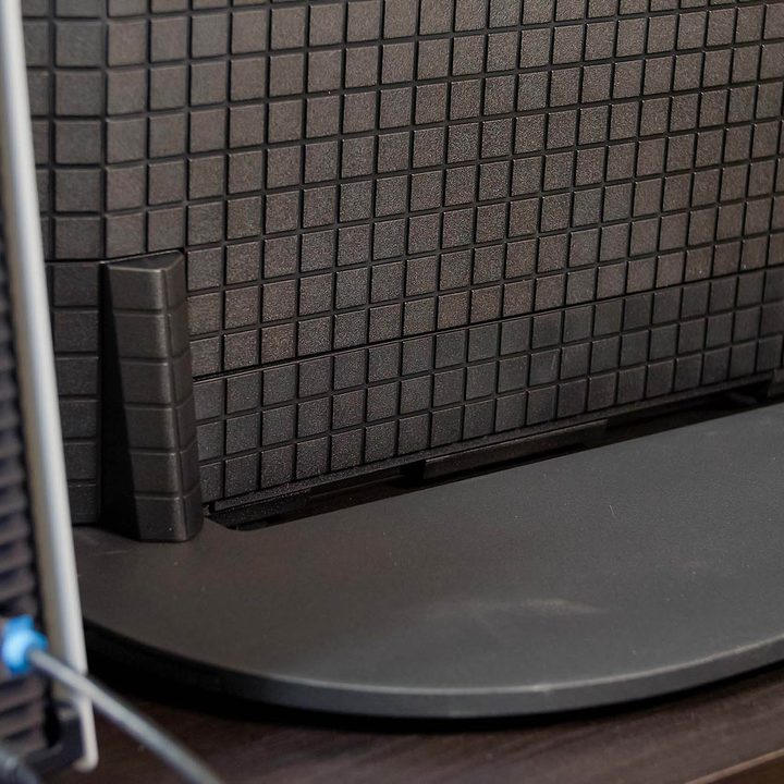 The Sony A95K TV's stand in the "traditional orientation."