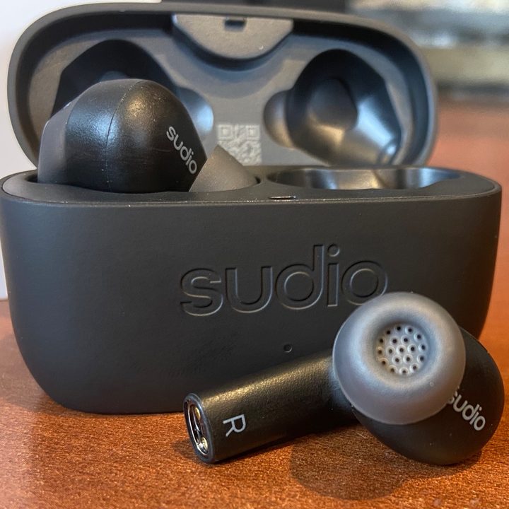 Details showing the speaker portion of the right earbud.