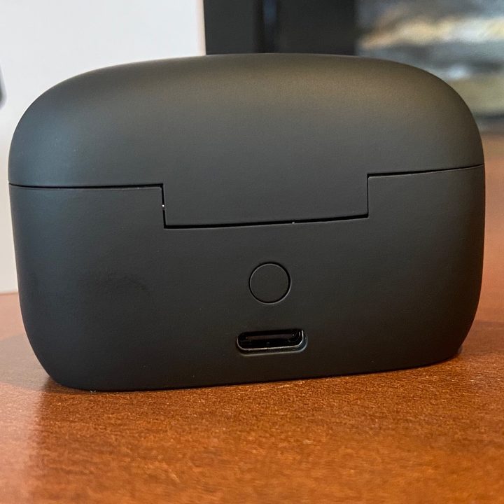 Sudio E2 wireless earbuds' charging case seen from the back..