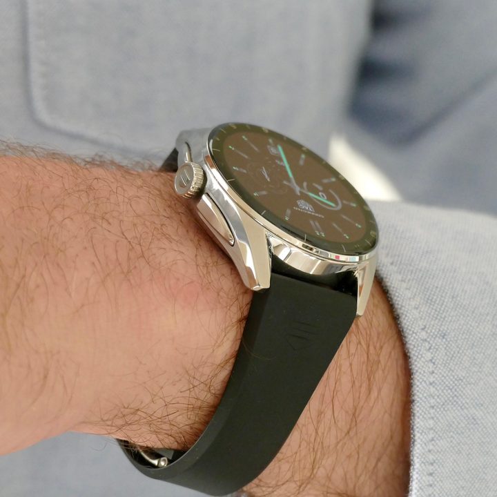 A side view of the Tag Heuer Connected Calibre E4 watch with crown and buttons visible.