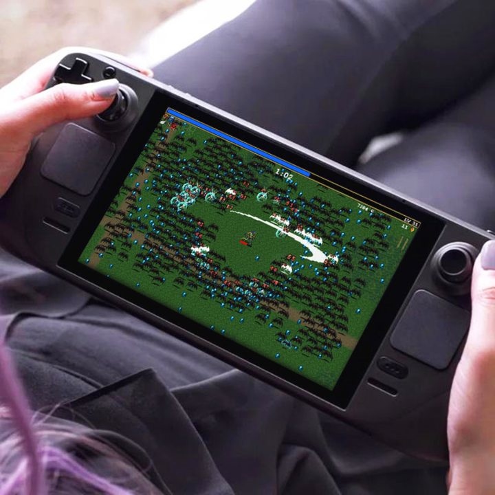 A woman plays Vampire Survivors on a Steam Deck.