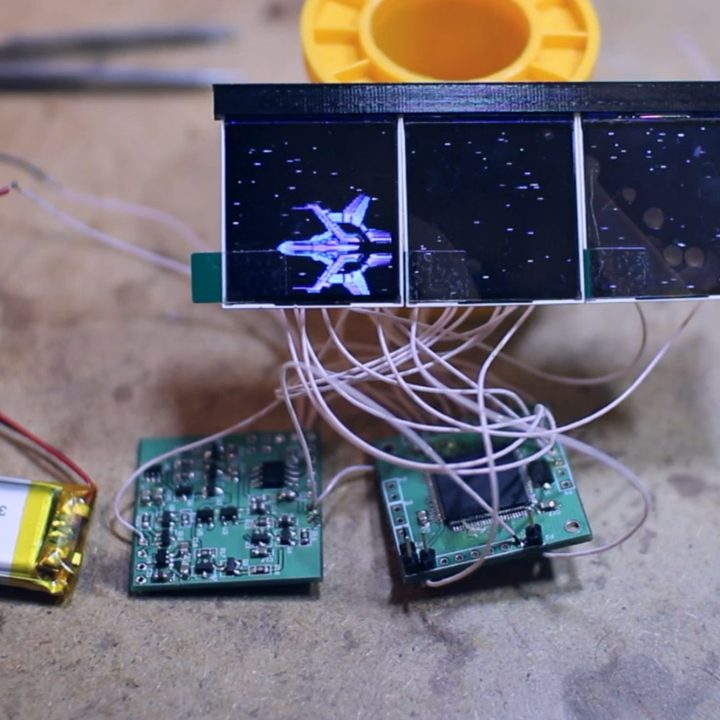 The Wowcube's components sit on a table.
