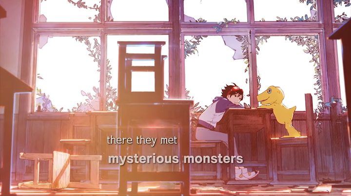 A kid resting at a desk with a digimon.
