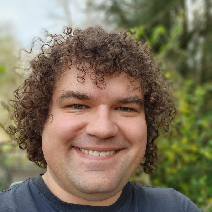 Portrait of a person with a blurred background.