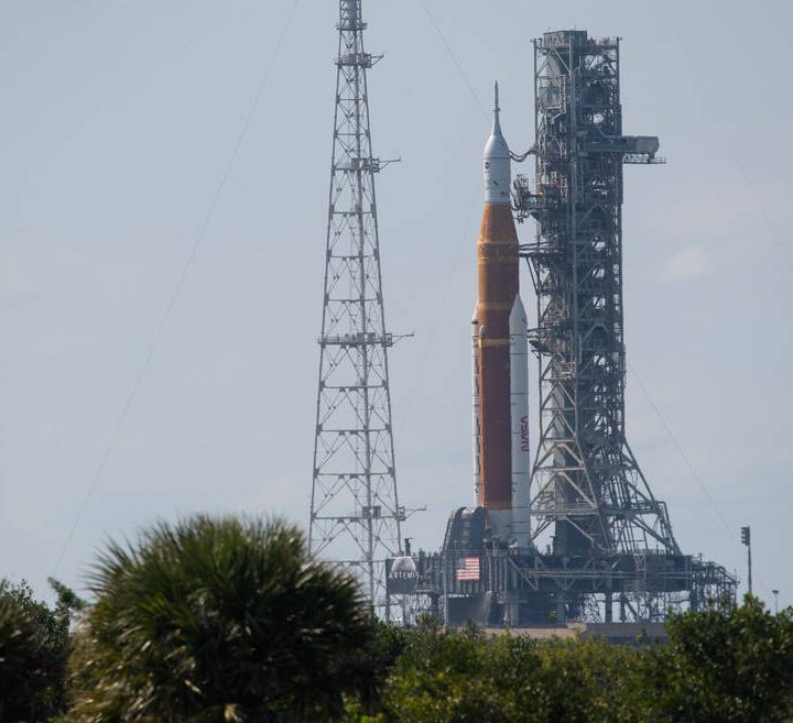 NASA’s Space Launch System (SLS) rocket with the Orion spacecraft aboard is seen atop a mobile launcher at Launch Complex 39B.