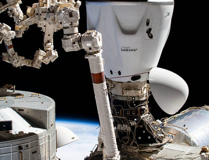 The SpaceX Dragon Endeavour crew ship is pictured docked to the Harmony module's space-facing international docking adapter.
