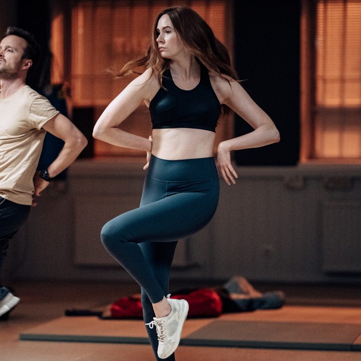 Aaron Paul and Karen Gillan try to hip-hop dance in a scene from Dual.