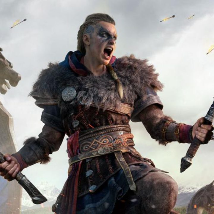 The protagonist of Assassin's Creed: Valhalla shouting in battle and wielding two axes.