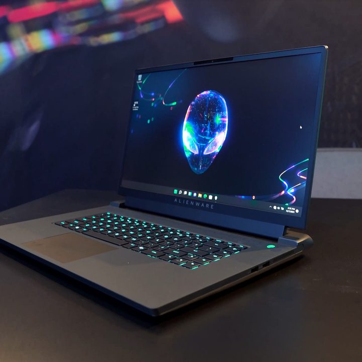 Alienware m17 R5 laptop sitting on a table.