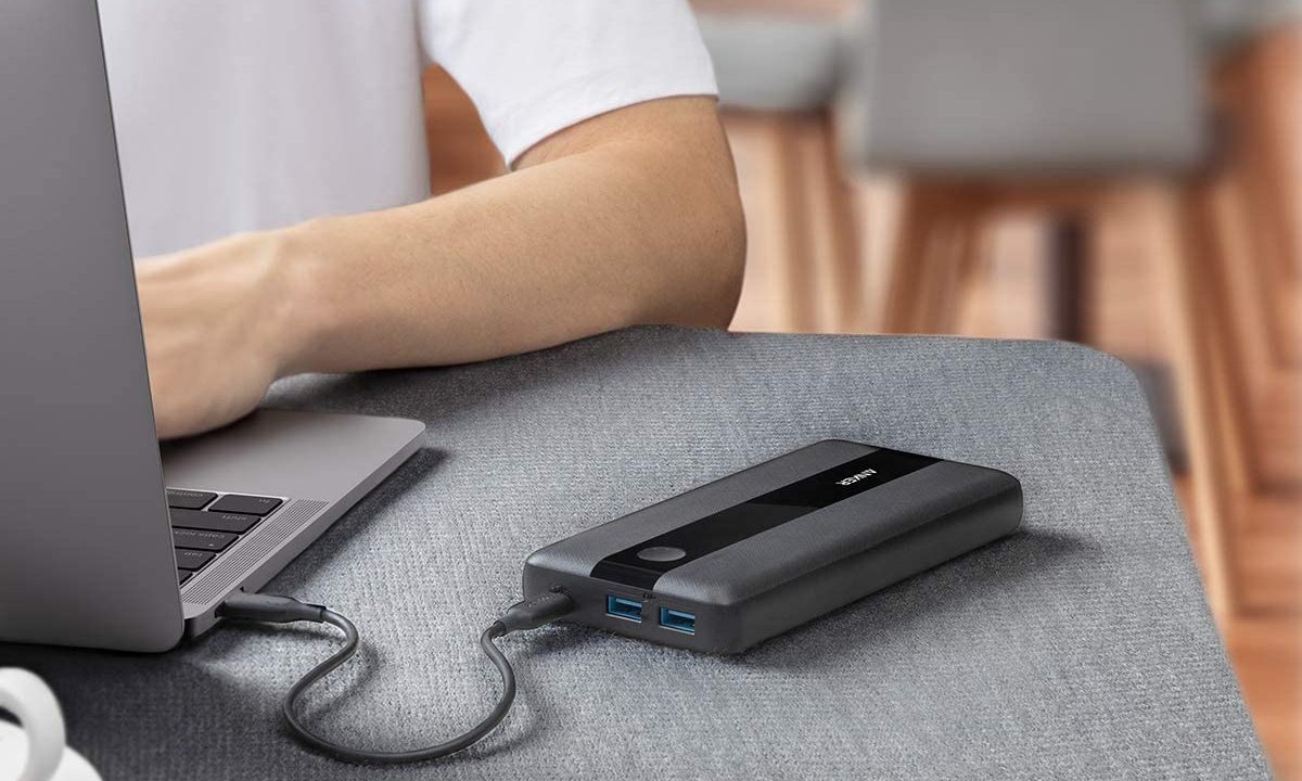 The Anker PowerCore III connected to laptop.