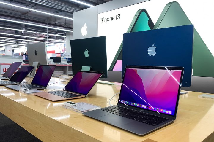 Apple products are seen in the store.