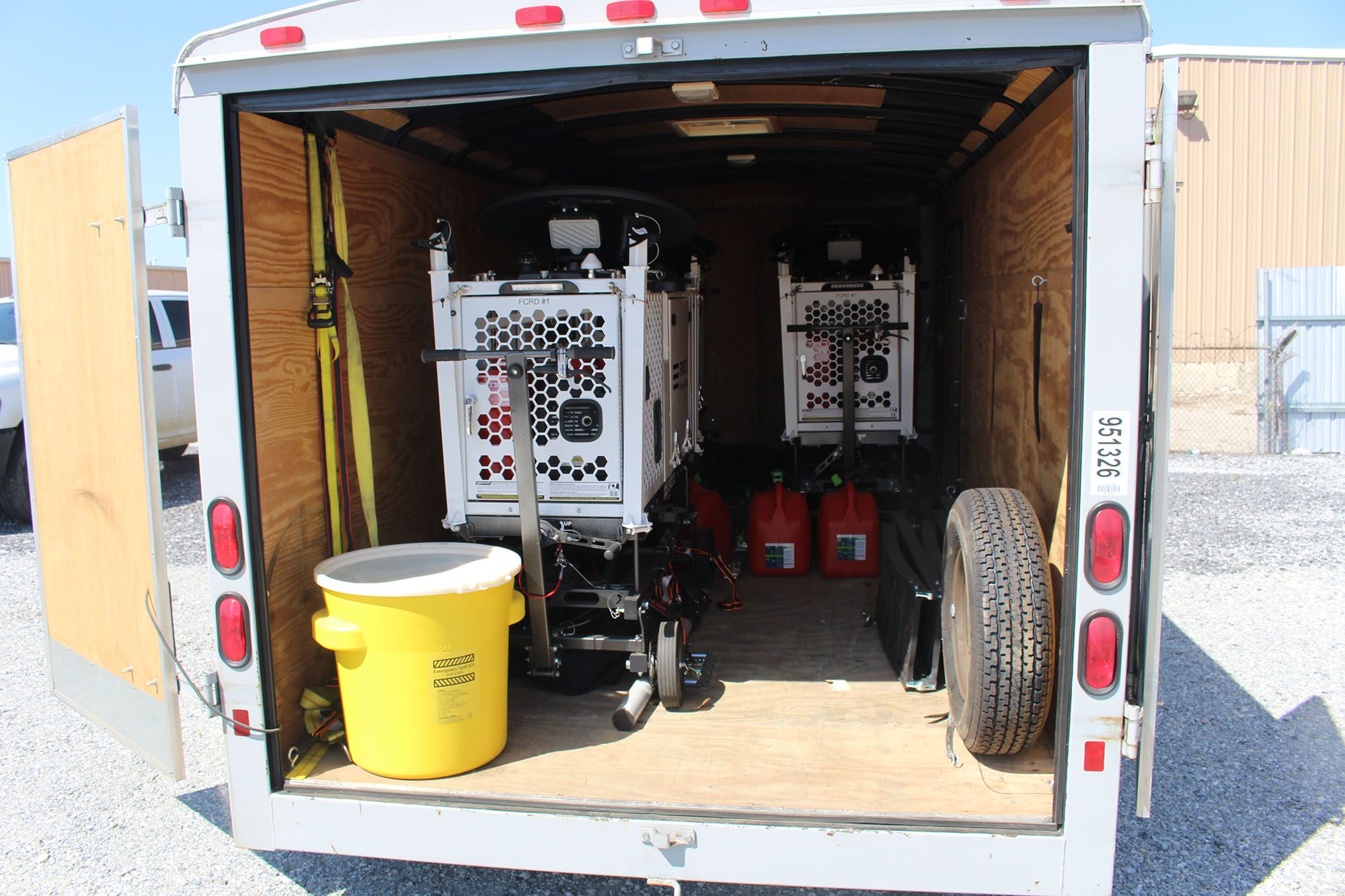 AT&T COWs loaded into a truck.
