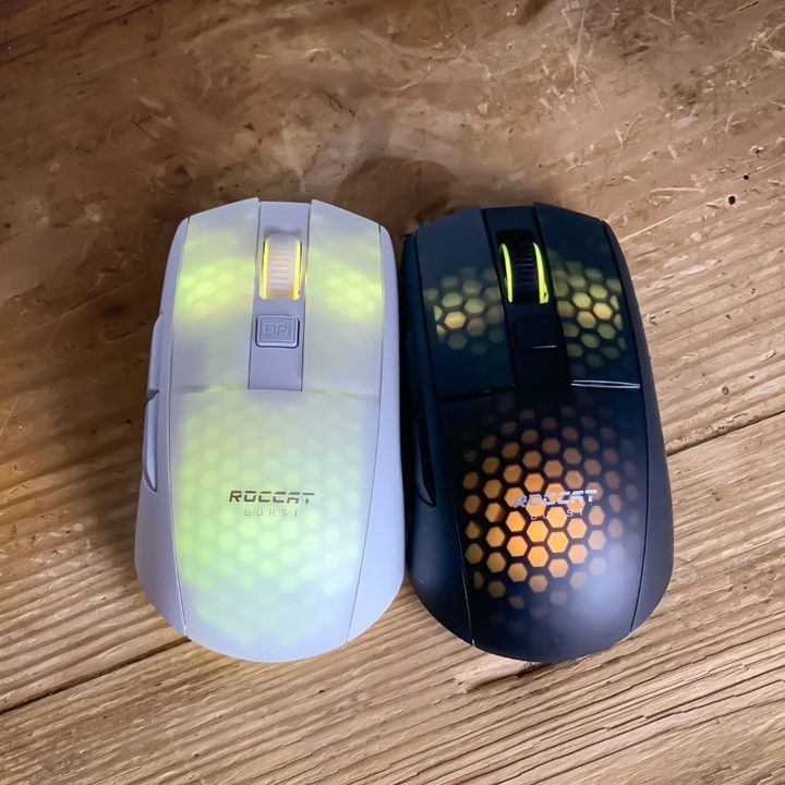black and white roccat burst pro air side by side.