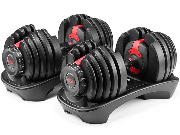 The Bowflex SelectTech 552 Adjustable Dumbbells in black and red, on a white background.