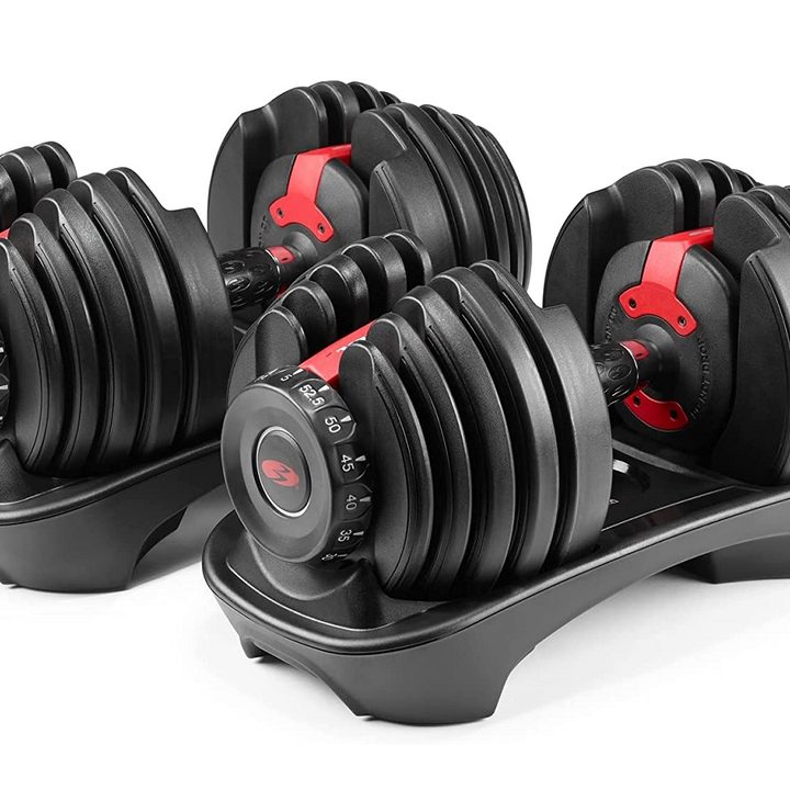 The Bowflex SelectTech 552 Adjustable Dumbbells in black and red, on a white background.