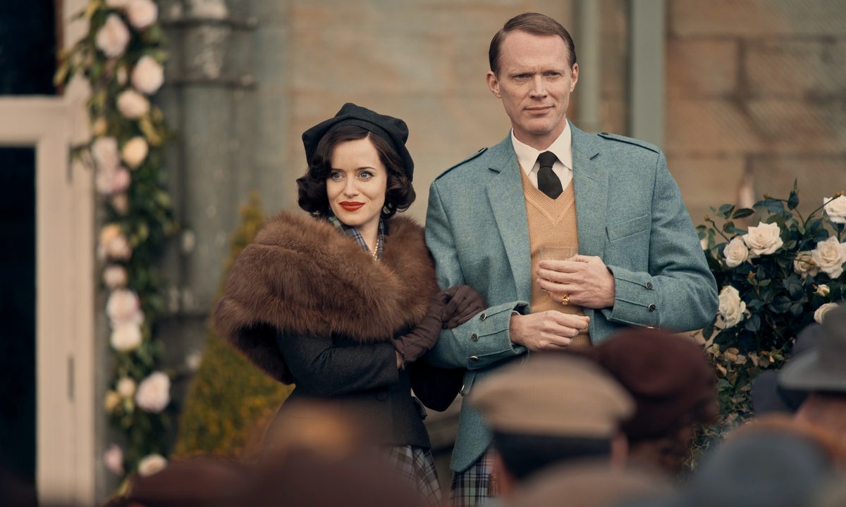 Claire Foy and Paul Bettany stand next to each other in A Very British Scandal.