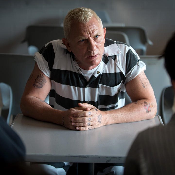Daniel Craig wears a prison jumpsuit in "Logan Lucky."