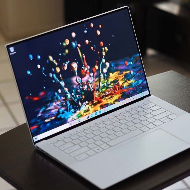 Dell XPS 15 OLED on a table.