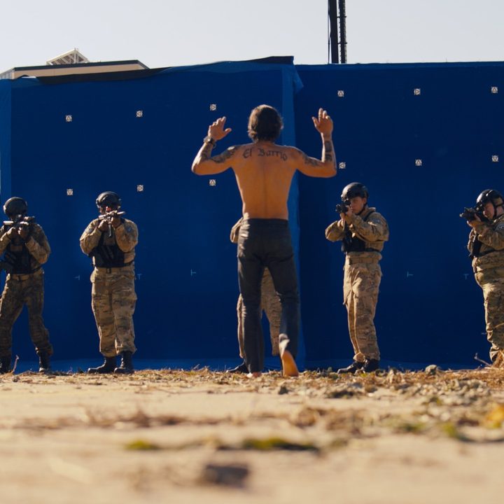 An early image from the DMZ series featuring actors in front of a blue screen.