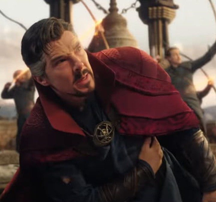 Doctor Strange holds his sides in pain in Doctor Strange in the Multiverse of Madness.