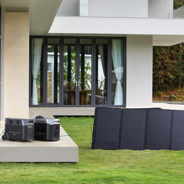 EcoFlow Delta Pro ecosystem with solar panels in backyard.