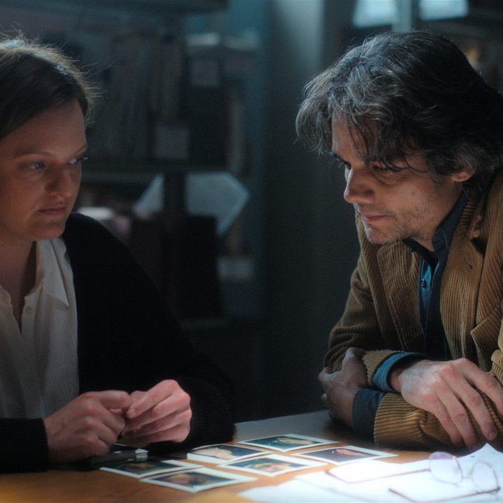 Elisabeth Moss sits next to Wagner Moura in Shining Girls.