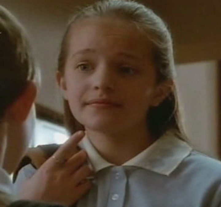 A young Elisabeth Moss is checked by a doctor in Picket Fences.
