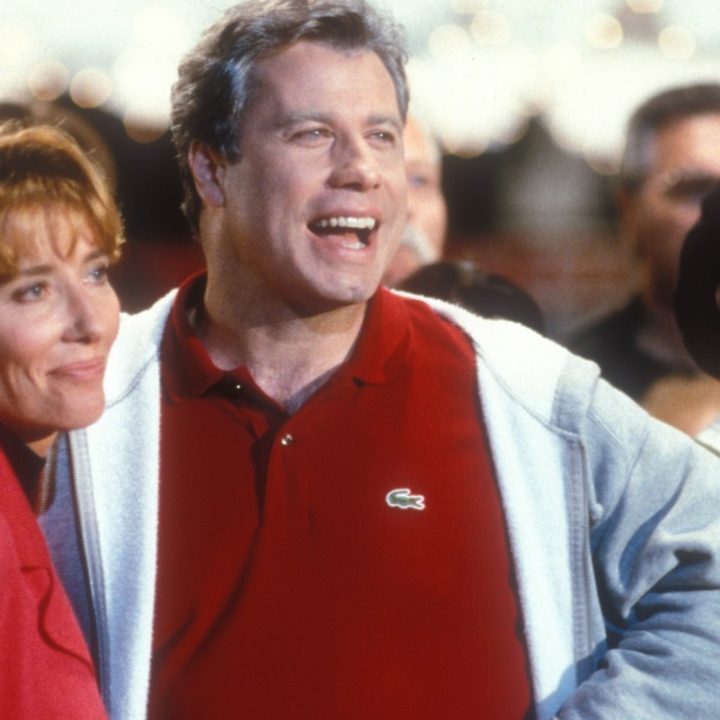 John Travolta and Emma Thompson in Primary Colors.