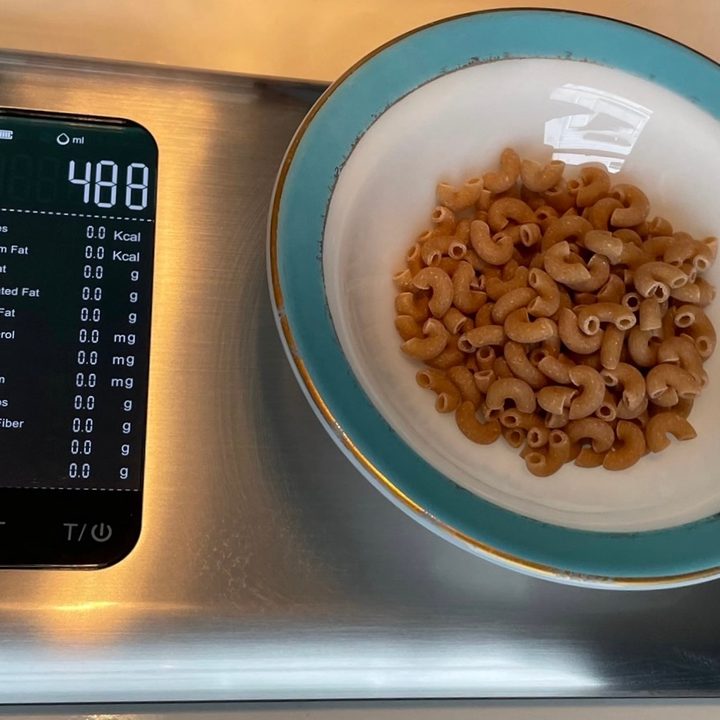 Etekcity ESN00 food scale at work weighing dry macaroni.